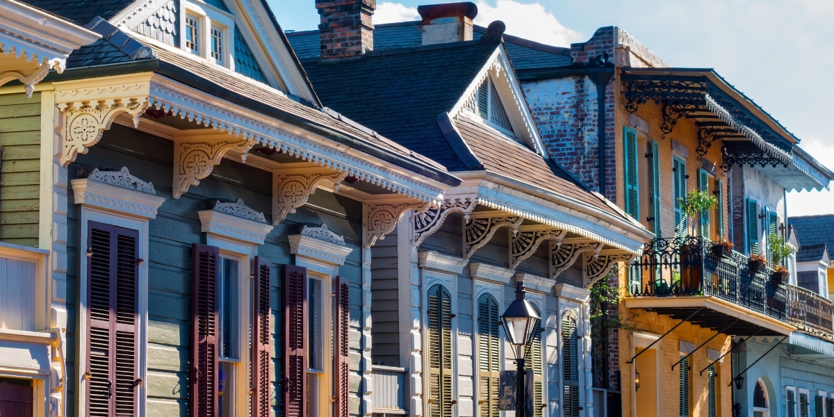 French Quarter homes with restored roofs, highlighting the charm of historic preservation in New Orleans.