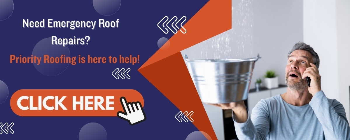 Man holding a bucket to catch water from a leaking ceiling while talking on the phone. Text reads 'Need Emergency Roof Repairs? Priority Roofing is here to help!' with a large 'Click Here' button and arrow graphics for emphasis.